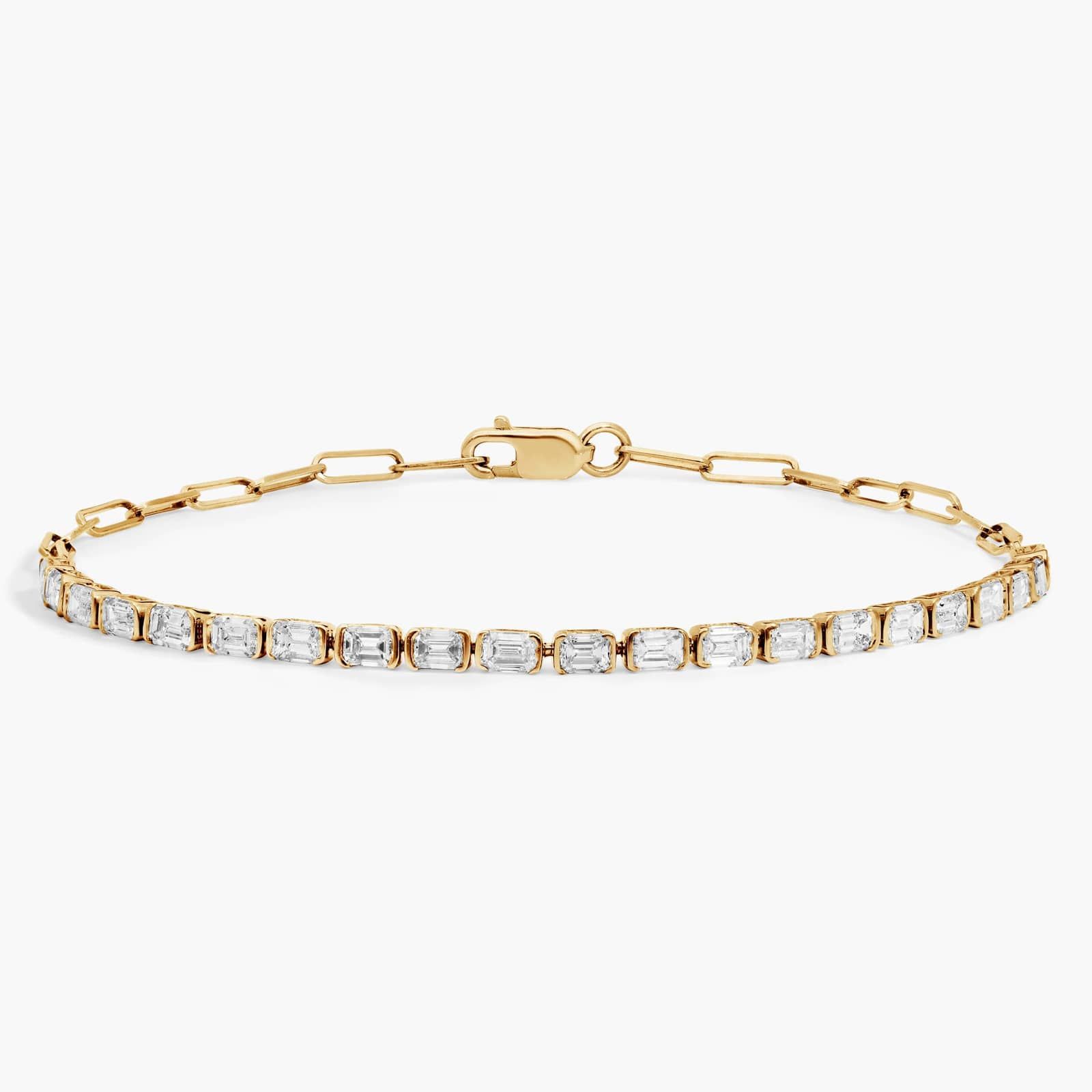 14K yellow gold emerald cut lab grown diamond tennis bracelets under $3000 featuring 2 CTW bezel-set diamonds and a paperclip chain.