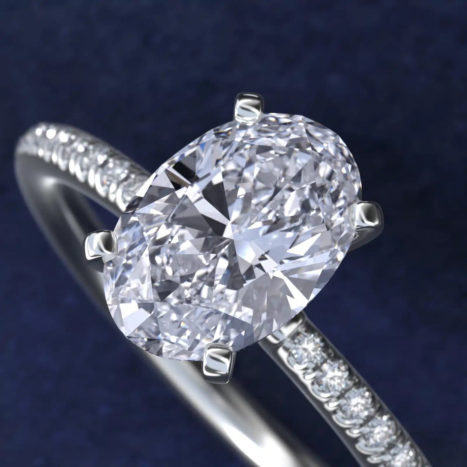 Platinum oval micropavé engagement rings under $2,500 featuring a 1 carat oval lab grown diamond and 22 natural diamond accents on a 1.70mm shank.