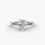 14K white gold oval solitaire engagement rings under $2,500 featuring a 1.5 carat colorless VS clarity lab grown diamond with a 2.00mm flush fit band.