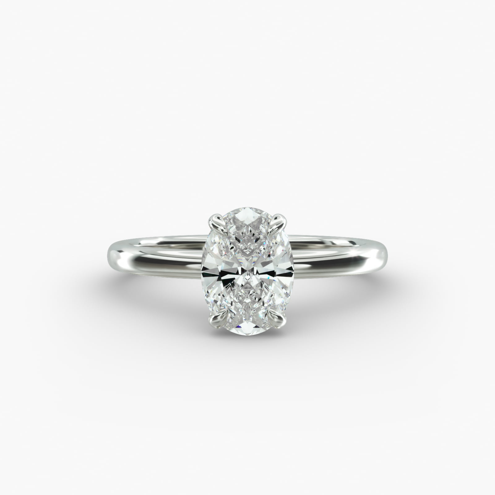 Platinum oval solitaire engagement rings under $2,500 featuring a 1.5 carat colorless VS clarity lab grown diamond with claw prongs and a flush fit band.