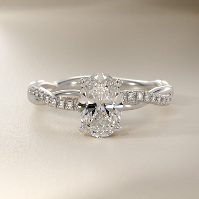 Platinum oval twist engagement rings under $2,500 featuring a 1 carat oval lab grown diamond and 20 natural diamond accents on a 2.80mm shank.