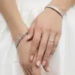 Platinum oval twist engagement rings under $2,500 featuring a 1 carat oval lab grown diamond and 20 natural diamond accents on a 2.80mm shank.