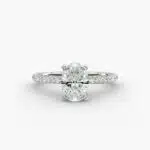 Platinum oval petite pavé engagement rings under $2,500 featuring a 1.5 carat oval lab-grown diamond and 20 French cut natural diamonds.