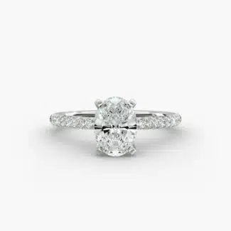 Platinum oval petite pavé engagement rings under $2,500 featuring a 1.5 carat oval lab-grown diamond and 20 French cut natural diamonds.