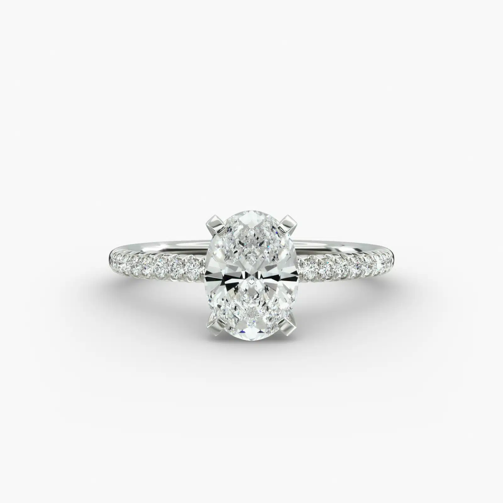 Platinum oval petite pavé engagement rings under $2,500 featuring a 1.5 carat oval lab-grown diamond and 20 French cut natural diamonds.