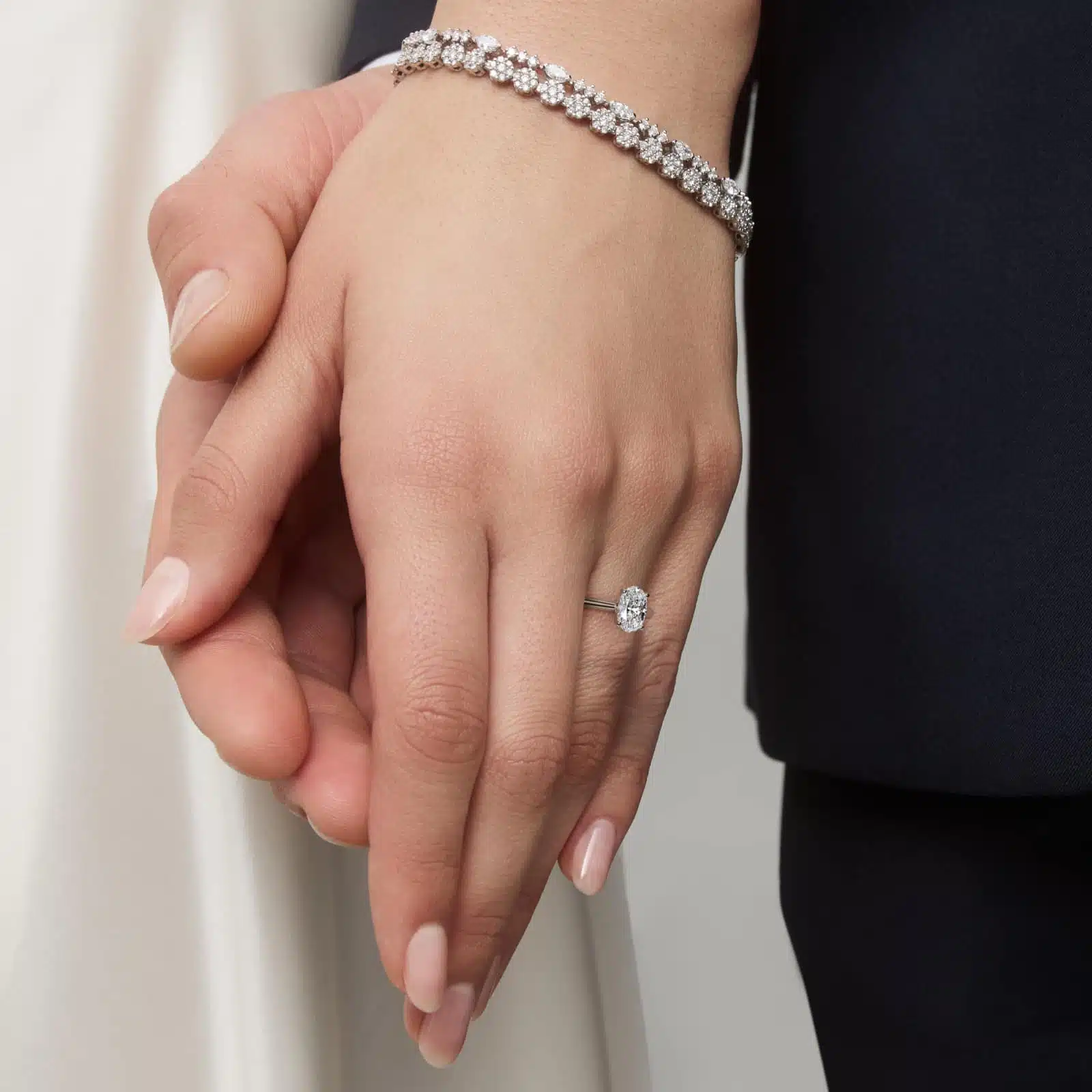 Platinum oval solitaire engagement rings under $2,500 featuring a 1.5 carat oval lab-grown diamond on a 1.80mm petite band.