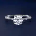 Platinum round micropavé engagement rings under $2,500 featuring a 1 carat round lab-grown diamond and 22 natural diamond accents on a 1.70mm band.