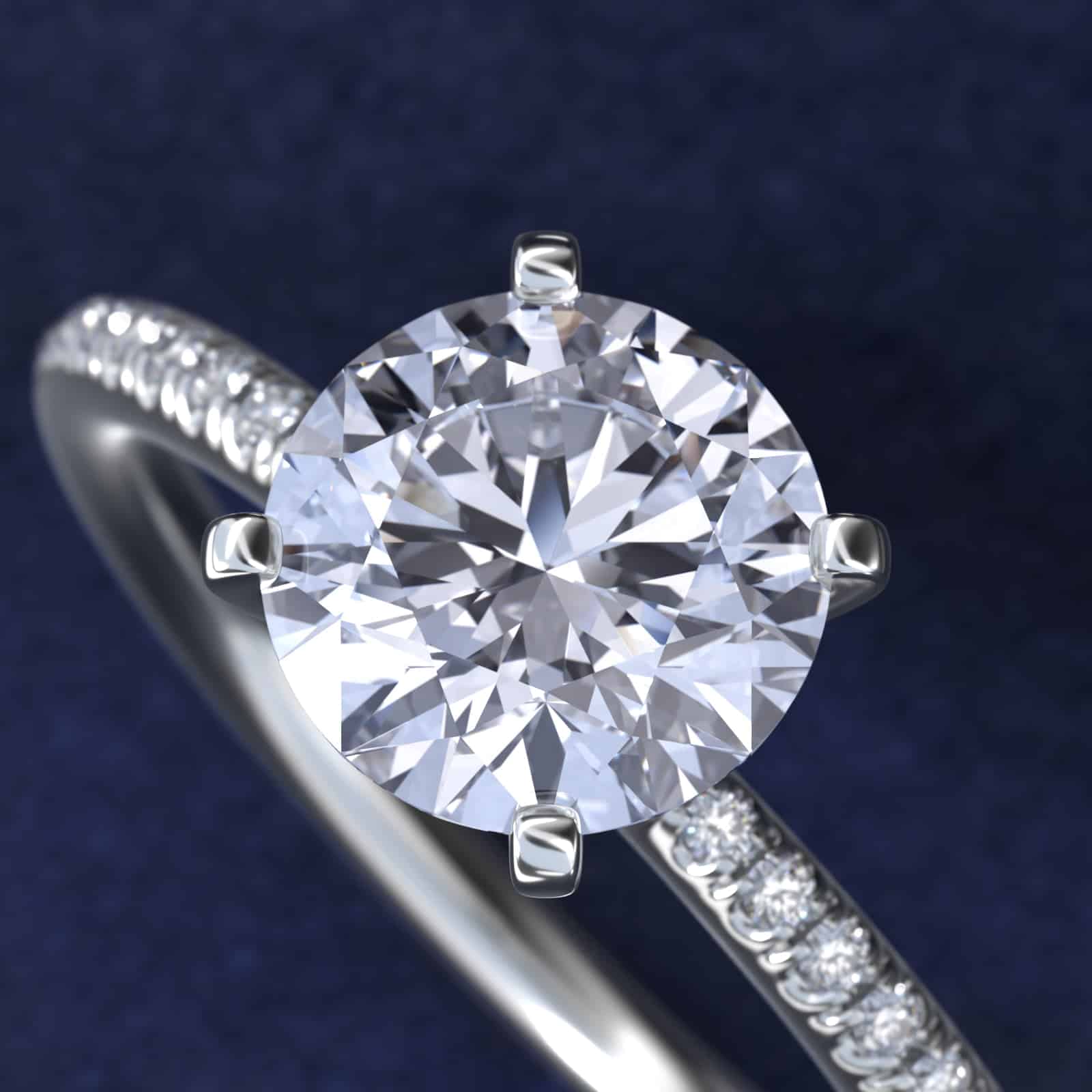 Platinum round micropavé engagement rings under $2,500 featuring a 1 carat round lab-grown diamond and 22 natural diamond accents on a 1.70mm band.