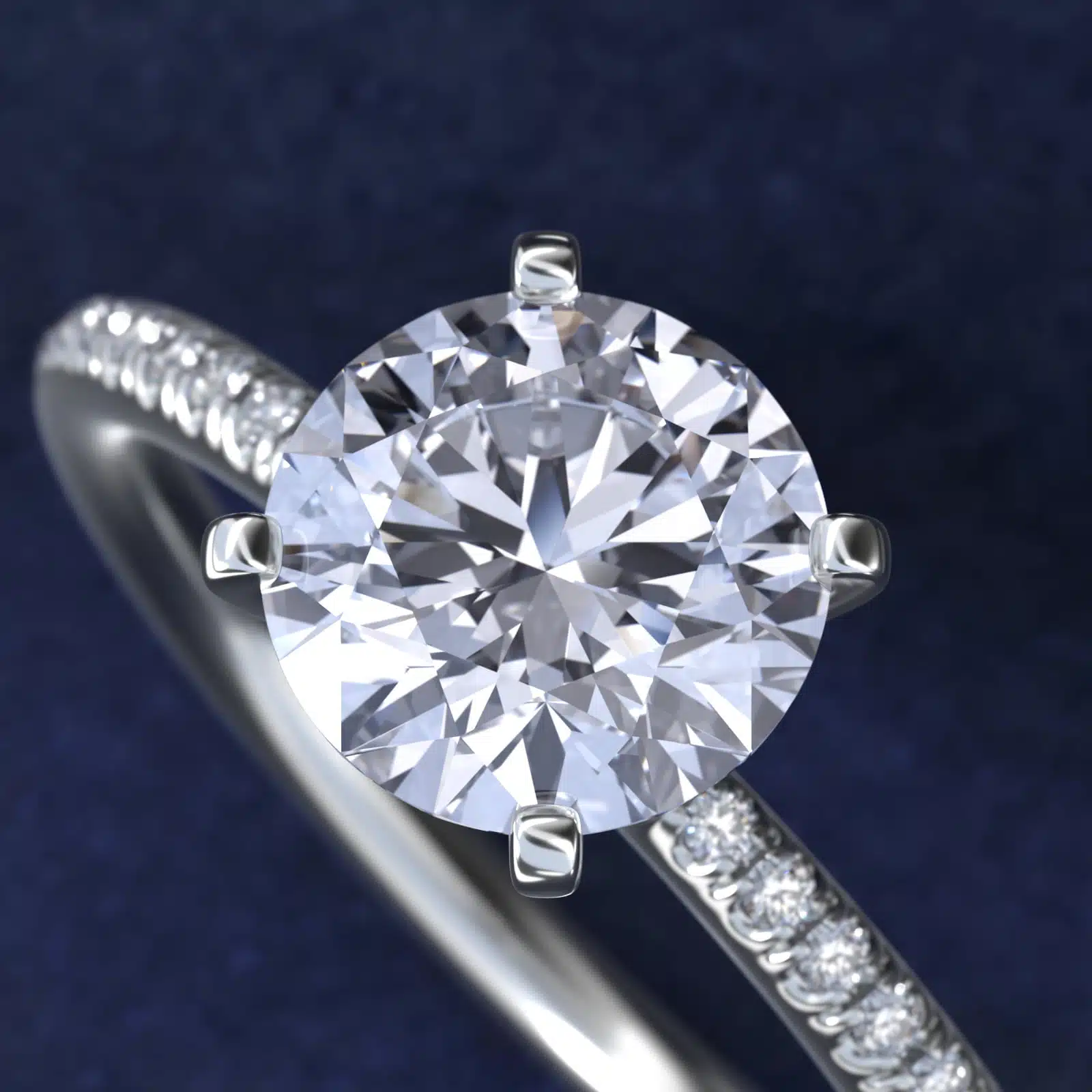 Platinum round micropavé engagement rings under $2,500 featuring a 1 carat round lab-grown diamond and 22 natural diamond accents on a 1.70mm band.