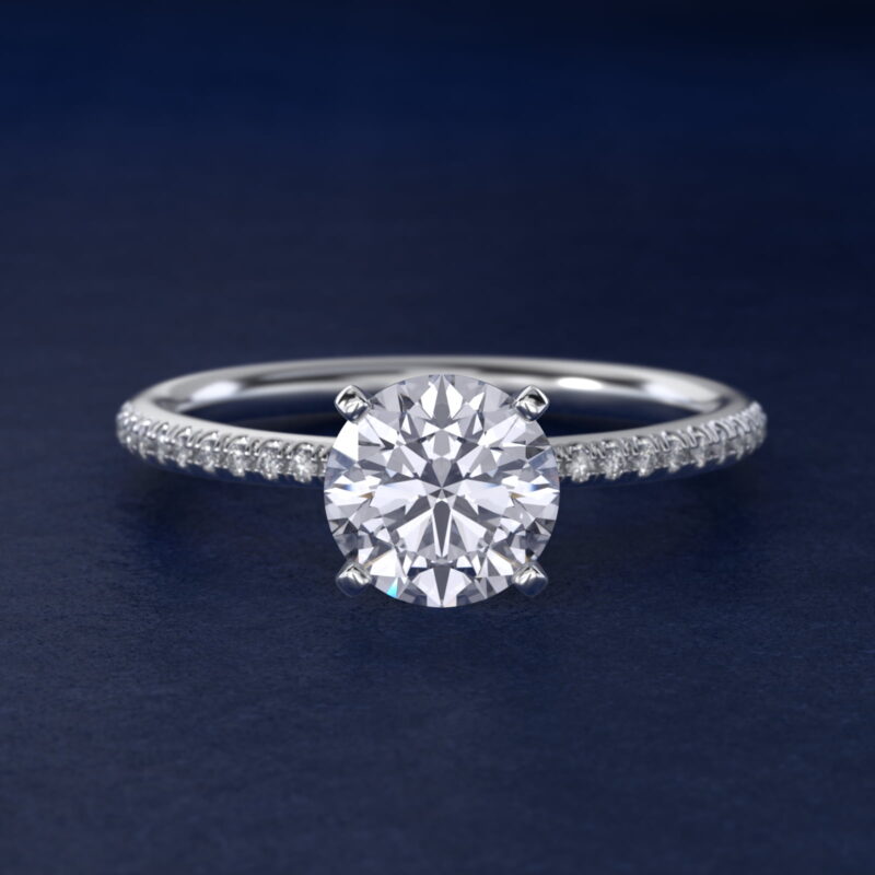 Platinum round micropavé engagement rings under $2,500 featuring a 1 carat round lab-grown diamond and 22 natural diamond accents on a 1.70mm band.