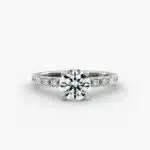 Platinum French cut pavé engagement rings under $2,500 featuring a 1 carat round lab grown diamond and 16 pavé side stones on a 1.60mm wire shank.