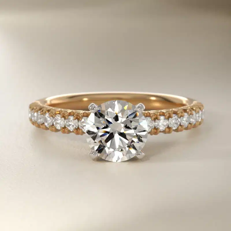 14K yellow gold French pavé engagement rings under $2,500 featuring a 1 carat round lab grown diamond and 16 natural diamond accents.