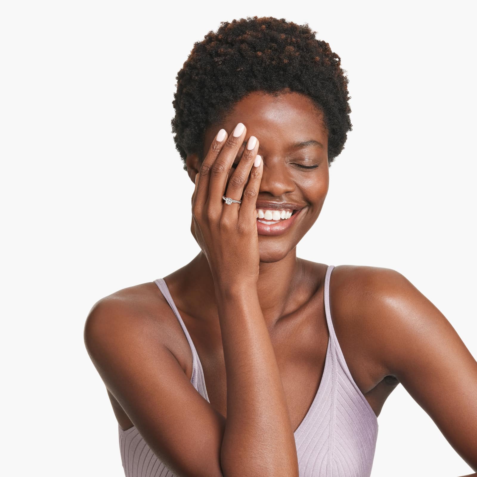 Platinum pavé rope engagement rings under $2,500 featuring a 1 carat round lab grown diamond and 24 interwoven natural diamonds on a 2.90mm band.