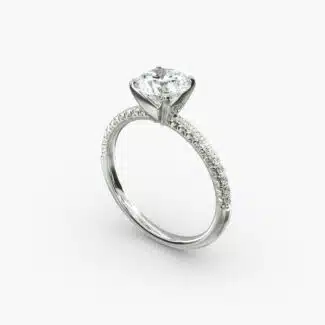 Platinum round petite pavé engagement rings under $2,500 featuring a 1.5 carat round lab-grown diamond and 20 French cut natural diamonds on a 1.60mm band.