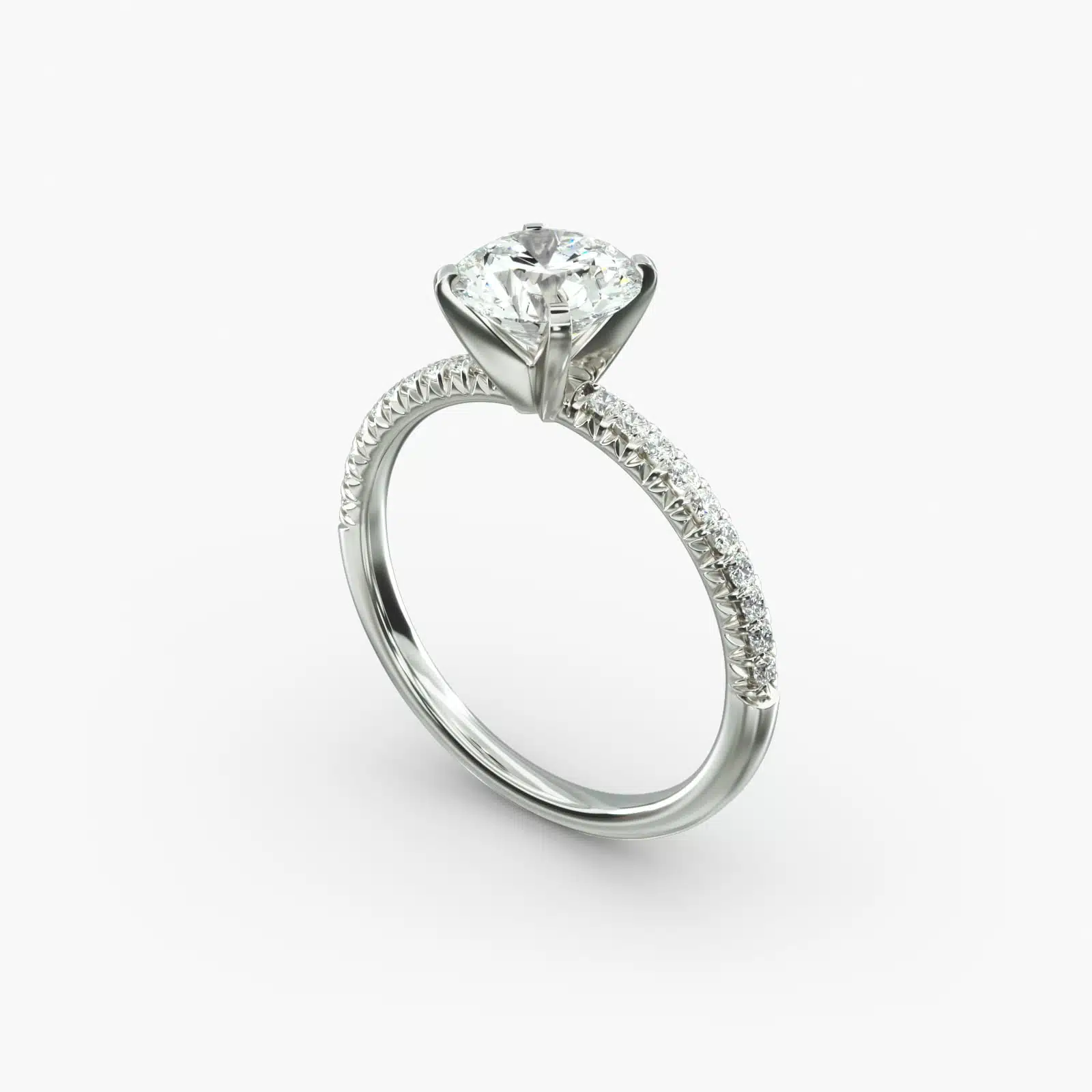 Platinum round petite pavé engagement rings under $2,500 featuring a 1.5 carat round lab-grown diamond and 20 French cut natural diamonds on a 1.60mm band.