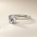 14K white gold micropavé engagement rings under $2,500 featuring a 1.5 carat round lab grown diamond and 22 natural diamond accents on a 1.70mm band.