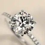 14K white gold micropavé engagement rings under $2,500 featuring a 1.5 carat round lab grown diamond and 22 natural diamond accents on a 1.70mm band.