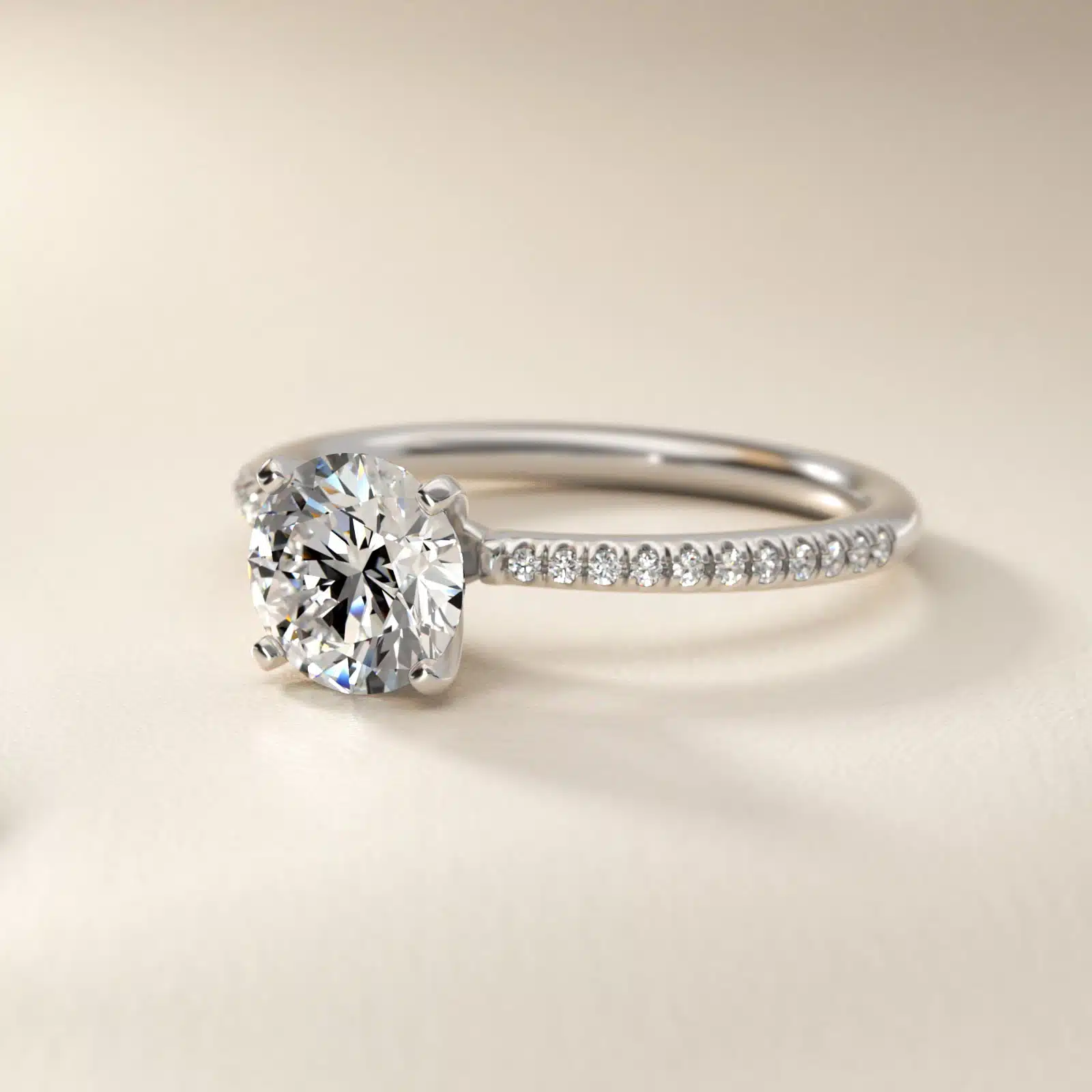 14K white gold micropavé engagement rings under $2,500 featuring a 1.5 carat round lab grown diamond and 22 natural diamond accents on a 1.70mm band.