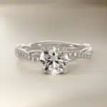 14K white gold petite twist engagement rings under $2,500 featuring a 1.5 carat round lab grown diamond and 20 pavé natural diamonds on a 2.80mm shank.