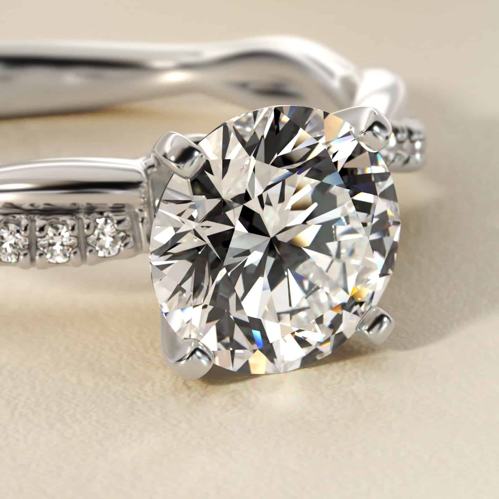 14K white gold petite twist engagement rings under $2,500 featuring a 1.5 carat round lab grown diamond and 20 pavé natural diamonds on a 2.80mm shank.