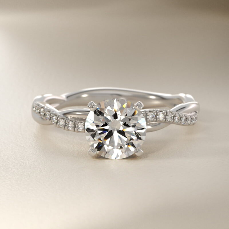 14K white gold petite twist engagement rings under $2,500 featuring a 1.5 carat round lab grown diamond and 20 pavé natural diamonds on a 2.80mm shank.