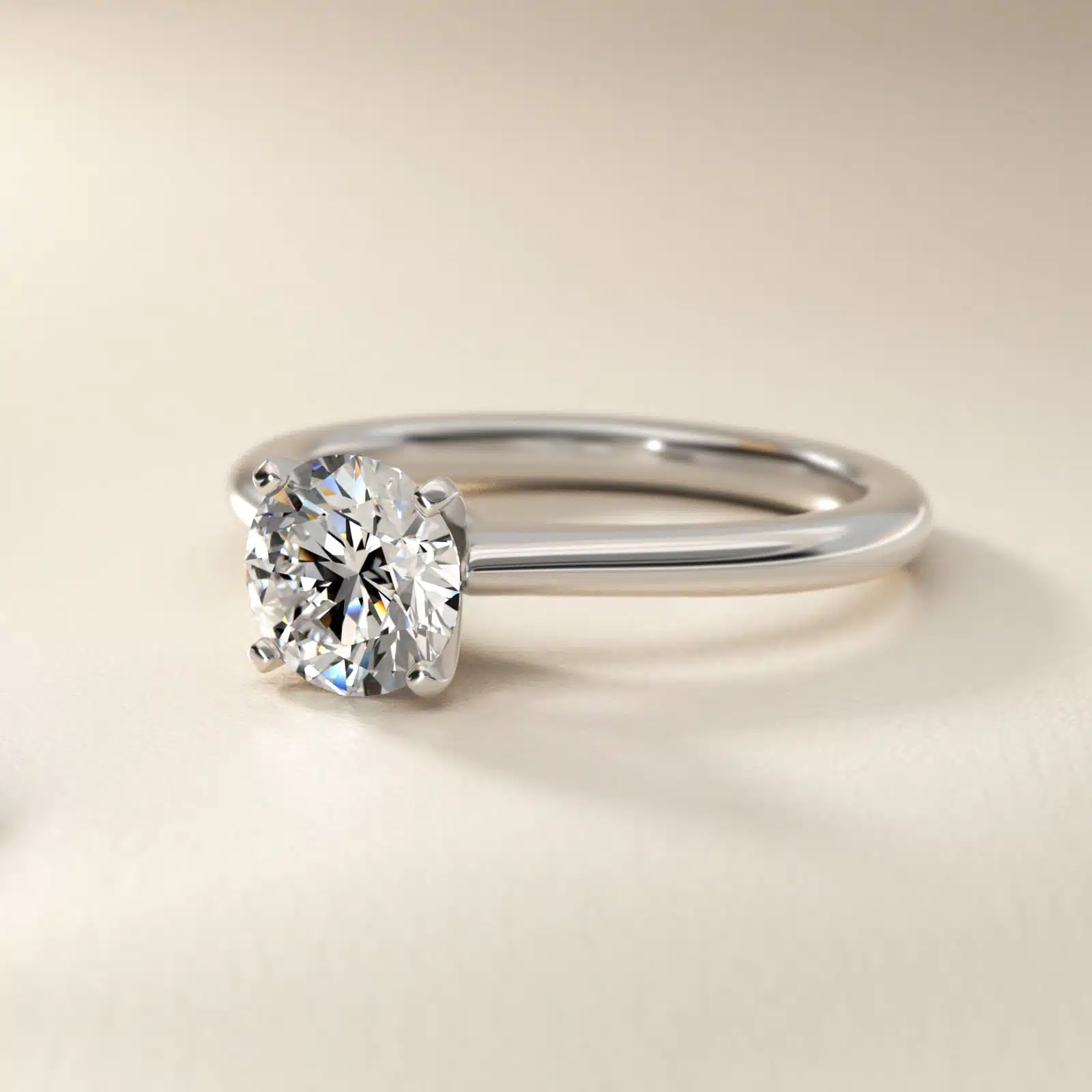 Platinum petite solitaire engagement rings under $2,500 featuring a 1.5 carat colorless VS clarity lab grown diamond on a 1.80mm band.