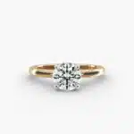14K yellow gold round solitaire engagement rings under $2,500 featuring a 2 carat colorless VS clarity lab grown diamond with claw prongs.