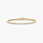 14K yellow gold round lab grown diamond tennis bracelets under $3000 featuring 3 CTW of brilliant-cut diamonds in basket settings.