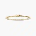 14K yellow gold round lab grown diamond tennis bracelets under $3000 featuring 3 CTW of brilliant-cut diamonds in basket settings.