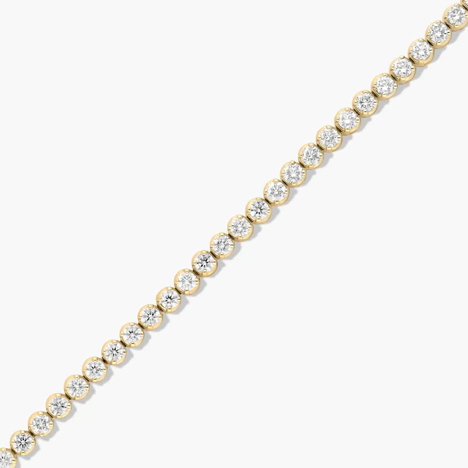 14K yellow gold round lab grown diamond tennis bracelets under $3000 featuring 3 CTW of brilliant-cut diamonds in basket settings.