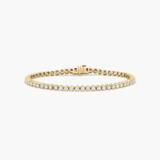 14K yellow gold round lab grown diamond tennis bracelets under $3000 featuring 3 CTW of brilliant-cut diamonds in basket settings.