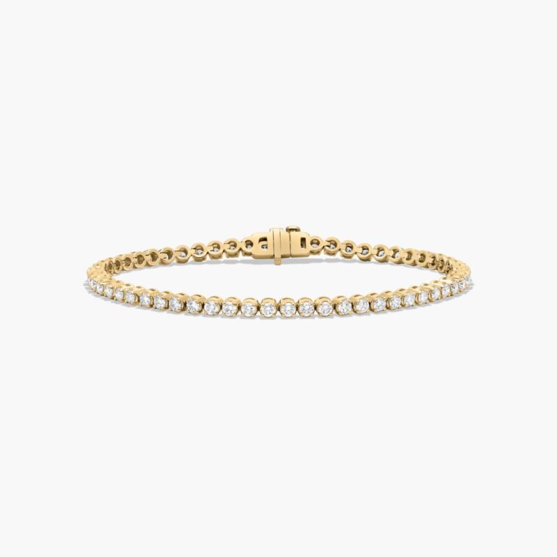 14K yellow gold round lab grown diamond tennis bracelets under $3000 featuring 3 CTW of brilliant-cut diamonds in basket settings.