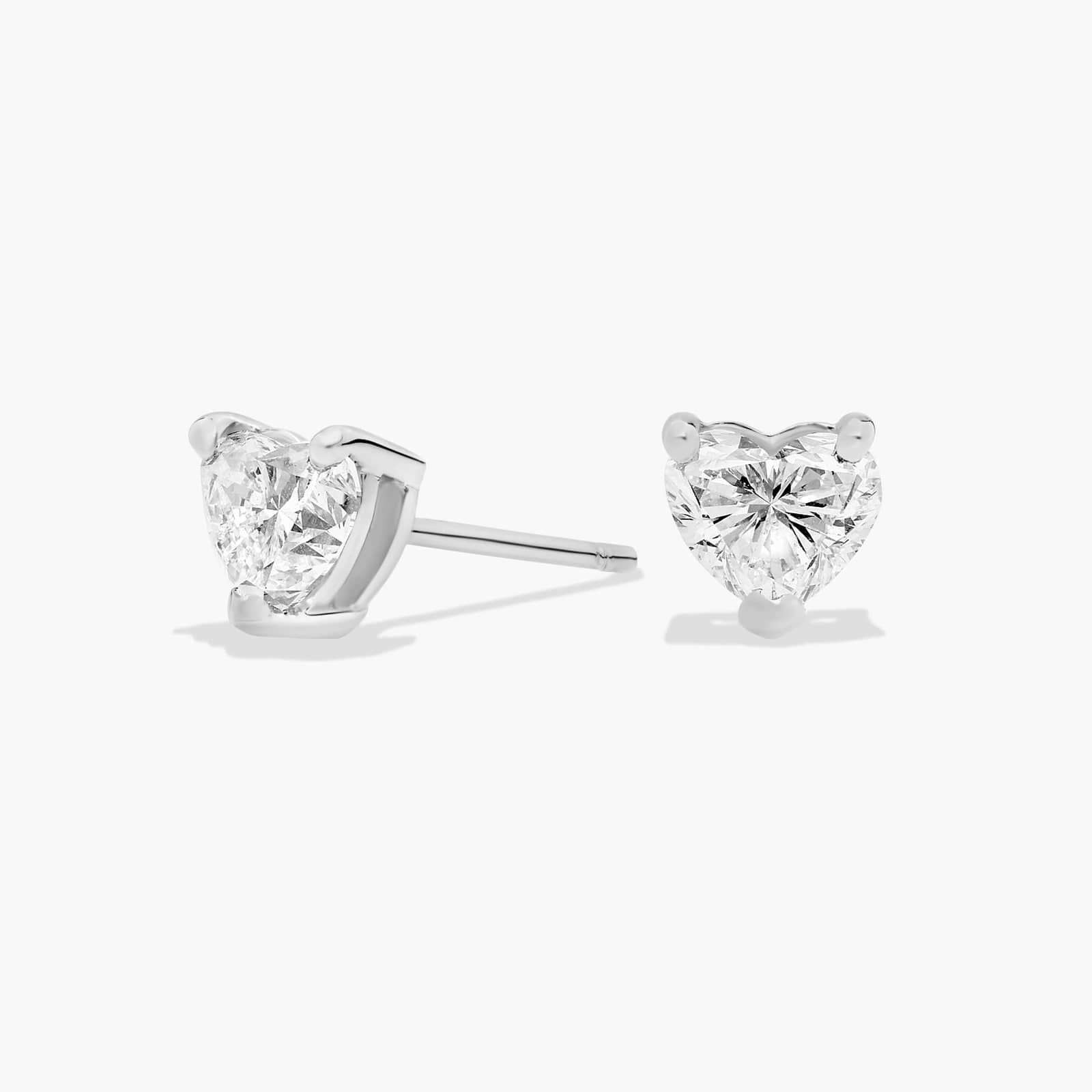 14k white gold heart-shaped lab grown diamond stud earrings featuring 1 ct. tw. colorless VS diamonds.